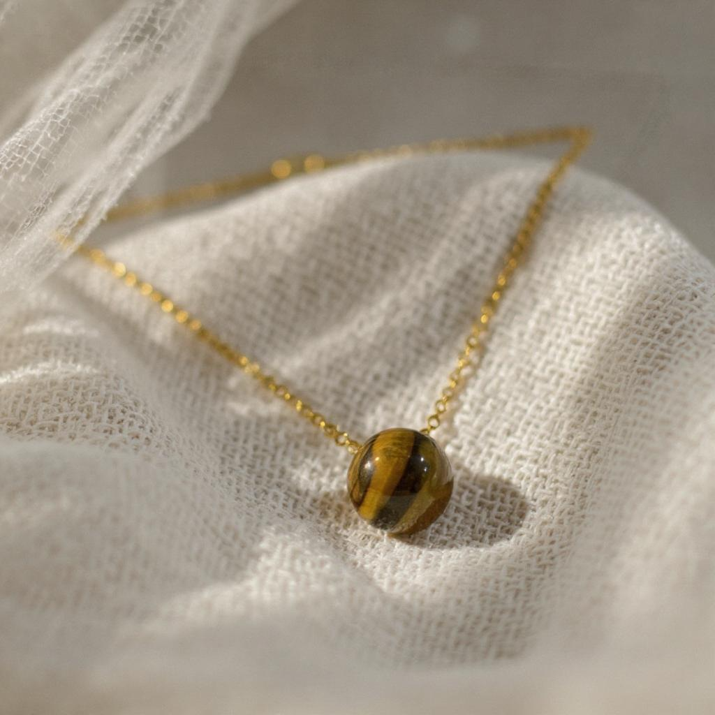 cuarzo en esfera con cadena de acero