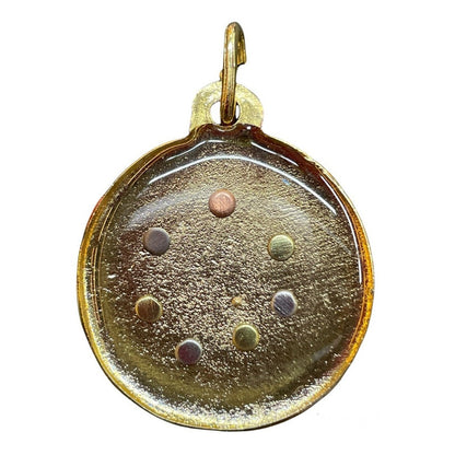 Witches Knot Pendant Encapsulated With The 7 Gold Plated Metals